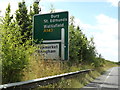 TM0474 : Roadsign on the A143 Bury Road by Geographer