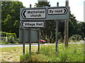 TM0074 : Roadsigns on the A143 Bury Road by Geographer