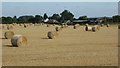 SO8739 : Round bales near Naunton by Philip Halling