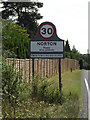 TL9567 : Norton Village Name sign by Geographer