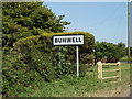 TM1292 : Bunwell Village Name sign on the B1113 The Turnpike by Geographer