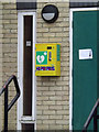 TL9370 : Defibrillator on Ixworth Village Hall by Geographer