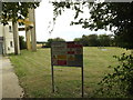 TL9669 : Stowlangtoft Water Tower sign by Geographer