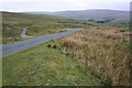 SD9395 : Bends in moorland road at Oxnop Top by Roger Templeman