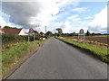 TM1094 : Entering Bunwell on Mile Road by Geographer