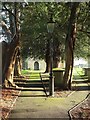 ST7678 : Churchyard paths, Tormarton by Derek Harper