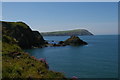 SN0439 : Cat Rock and cliffs from Carreg Germain by Christopher Hilton