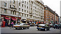 TQ2780 : East on Oxford Street near Marble Arch Underground, 2002 by Ben Brooksbank