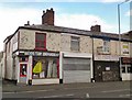 SJ9495 : Shops on Manchester Road by Gerald England