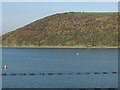 SW9473 : Buoys and floats, Camel estuary by Derek Harper