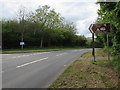 SY1589 : Brown direction and distances sign, Trow, Devon by Jaggery