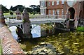 TM1857 : Helmingham Hall: Drawbridge by Michael Garlick