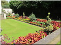 TQ2782 : The Holme, formal garden with bedding plants and topiary by David Hawgood