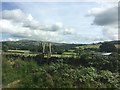 SD9947 : Ladder stile and footpath in the Aire valley by Graham Hogg