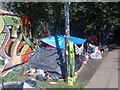 TQ2984 : Tent beside Regents Canal by David Anstiss