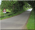 ST9998 : Warning sign on the road to Ewen - low arch bridge ahead by Jaggery