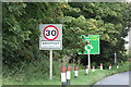 TF8207 : Roadsign & Swaffham Town Name sign by Geographer