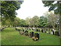 NZ3364 : Lines of headstones, Jarrow Cemetery by Graham Robson