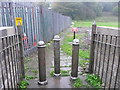 SE0423 : Bollards on Sowerby Bridge FP40, Luddendenfoot by Humphrey Bolton