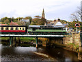 NZ8909 : NYMR Diesel Train Crossing the Railway Bridge at Ruswarp by David Dixon