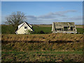 TL4786 : Deteriorating houses at Purls Bridge by Hugh Venables