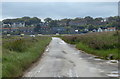 TG0444 : Beach Road crossing the Cley Marshes by Mat Fascione