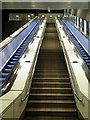 NZ2464 : Steps & escalators, St James Metro Station by Andrew Curtis