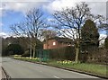 SJ7745 : Bus shelter with daffodils by Jonathan Hutchins