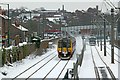 SK5543 : Tram and train at Basford by Alan Murray-Rust