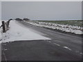 ST9404 : Tarrant Keyneston: minor snowdrift on the B3082 by Chris Downer