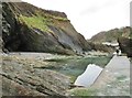 SS5747 : Cave entrance  and Rock Pool, Combe Martin, Devon by Derek Voller