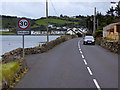 D3608 : Coast Road at Ballygalley by David Dixon