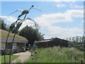 SP9313 : Three Iron Birds fly over the Visitor Centre and Graham's Hide at College Lake by Chris Reynolds