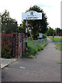 TM1031 : Lawford Village Name sign by Geographer