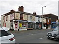 SJ9495 : Shops on Manchester Road by Gerald England