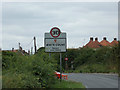 TL8728 : White Colne Village Name sign by Geographer