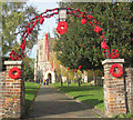 SP9211 : The main gateway to Tring Church - with poppies for Armistice Day by Chris Reynolds