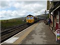 SD7678 : A southbound freight train passes through Ribblehead station by Marathon