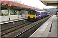 SE0623 : Passenger train departs Sowerby Bridge Station for Manchester by Roger Templeman