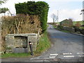 SH8356 : Water trough alongside the B5113 in Nebo by John S Turner