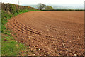 SX7759 : Tilled field by Copperthorn Cross by Derek Harper