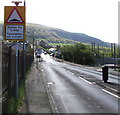 SO1205 : Warning sign - humps for half-a-mile, Carn-y-tyla Terrace, Abertysswg  by Jaggery