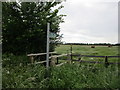  : Footbridge and footpath sign near Stow Farm by Jonathan Thacker