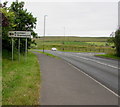 SO1009 : Butetown direction sign south of Llechryd by Jaggery