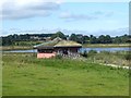 SE3663 : The main hide and West Lagoon, Staveley Nature Reserve by Oliver Dixon