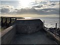 TF7745 : Pillbox and sea defences at Brancaster in Norfolk by Richard Humphrey