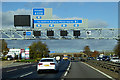 TL0328 : Northbound M1, Overhead Sign Gantry at the Toddington Service Area by David Dixon