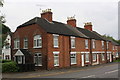 SK9234 : Row of houses on southwest side of A52 by Roger Templeman