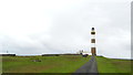 HY7855 : On North Ronaldsay - view N to Lighthouse by Colin Park