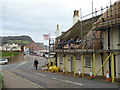 SY1287 : Sidmouth - thatchers at work by Chris Allen